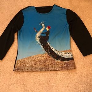 Decorate top with woman on peacock
